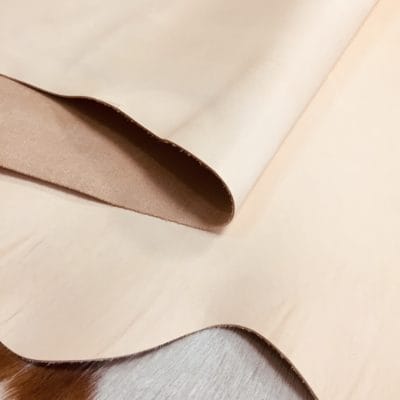 what is veg tan leather Tuscany leather is a 100% organic, soft and sustainable 2/3oz Veg Tan leather. It is made from plant extracts that undergo sustainable growth, harvest, and processing methods. The leather contains no toxic substances and is metal-free and chrome-free, making it an eco-friendly option. It is a popular choice for footwear, leather goods, saddlery, belts, gloves, and more. Its sustainable nature and eco-friendliness make it an excellent choice for those who prioritize environmentally friendly practices.