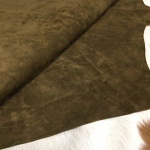 This exquisite collection features Pigskin Nubuck Leather, a suede with utmost softness that adds sophistication to any outfit. The timeless palette of natural colors perfectly complements the eye-catching hues, offering a versatile range of options. The suede's supple texture is incredibly tempting to the touch, and the leather comes from domestic pigs processed as whole hides with a thickness of 3 oz and an average size of 5-6 sq. ft. Additionally, the nubuck texture and medium soft temper of the suede perfectly highlight its exquisite suede texture. The leather is tanned using the chrome tannage method and is sourced from Taiwan. This exquisite collection is worth checking out, Perfect for footwear, accessories, handbags, apparel, belts, and DIY projects. What is Nubuck Leather? Top Grain Leather whose surface has been buffed and brushed to create a soft, velvety effect. Differs from suede in that while suede is created from the flesh (inner) side of a hide, nubuck is created using the grain (outer) side, giving it added strength and durability. You chose this leather because of its natural beauty, soft hand, and luxurious feel. Through years of experience, we have developed unique ways to maintain and protect these naturally tanned leathers. The lack of a coated finish requires special attention.