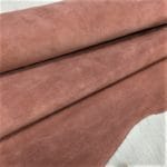 This exquisite collection features Pigskin Nubuck Leather, a suede with utmost softness that adds sophistication to any outfit. The timeless palette of natural colors perfectly complements the eye-catching hues, offering a versatile range of options. The suede's supple texture is incredibly tempting to the touch, and the leather comes from domestic pigs processed as whole hides with a thickness of 3 oz and an average size of 5-6 sq. ft. Additionally, the nubuck texture and medium soft temper of the suede perfectly highlight its exquisite suede texture. The leather is tanned using the chrome tannage method and is sourced from Taiwan. This exquisite collection is worth checking out, Perfect for footwear, accessories, handbags, apparel, belts, and DIY projects.