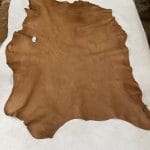 Florence is full-grain lambskin leather with an aniline finish, showcasing natural blemishes and rich character through transparent dyes for a raw, authentic look.