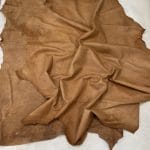 Florence is full-grain lambskin leather with an aniline finish, showcasing natural blemishes and rich character through transparent dyes for a raw, authentic look.