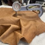 Florence is full-grain lambskin leather with an aniline finish, showcasing natural blemishes and rich character through transparent dyes for a raw, authentic look.