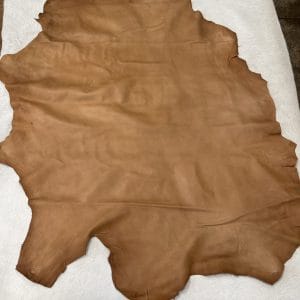 Florence is full-grain lambskin leather with an aniline finish, showcasing natural blemishes and rich character through transparent dyes for a raw, authentic look.