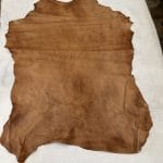 Florence is full-grain lambskin leather with an aniline finish, showcasing natural blemishes and rich character through transparent dyes for a raw, authentic look.
