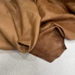 Florence is full-grain lambskin leather with an aniline finish, showcasing natural blemishes and rich character through transparent dyes for a raw, authentic look.