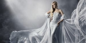 "Elegant woman in shimmering white gown representing fashion and style."