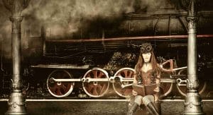 Steampunk fashion model with leather corset and vintage accessories