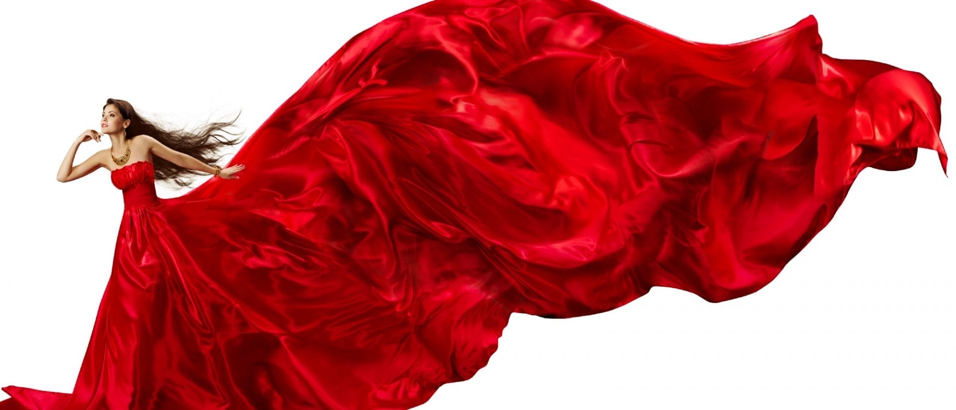 Runway model in bold red satin gown showcasing fashion accessories