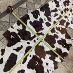 This classic chestnut and white cowhide features a natural horse-print pattern, perfect for rustic or Western-inspired designs. Ideal for handbags, furniture, footwear, garments, pillows, and décor.