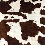 This classic chestnut and white cowhide features a natural horse-print pattern, perfect for rustic or Western-inspired designs. Ideal for handbags, furniture, footwear, garments, pillows, and décor.