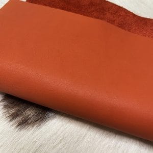 The Milano Cow Leather Collection is made of full-grain European leather produced from whole hides. This gives the leather a soft and luxurious finish on the surface, resulting in a subtle yet rich appearance. The collection is available in 48 complementary colors and is lightly pigmented and flexible, making it an excellent option for cutting. The Milano Collection is unbuffed and chrome-tanned, giving these leathers a smooth and elegant look.
