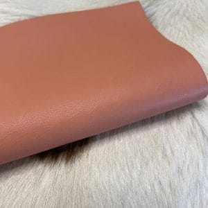 The Milano Cow Leather Collection is made of full-grain European leather produced from whole hides. This gives the leather a soft and luxurious finish on the surface, resulting in a subtle yet rich appearance. The collection is available in 48 complementary colors and is lightly pigmented and flexible, making it an excellent option for cutting. The Milano Collection is unbuffed and chrome-tanned, giving these leathers a smooth and elegant look.