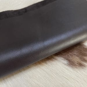 The Milano Cow Leather Collection is made of full-grain European leather produced from whole hides. This gives the leather a soft and luxurious finish on the surface, resulting in a subtle yet rich appearance. The collection is available in 48 complementary colors and is lightly pigmented and flexible, making it an excellent option for cutting. The Milano Collection is unbuffed and chrome-tanned, giving these leathers a smooth and elegant look.