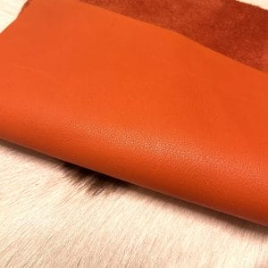 The Milano Cow Leather Collection is made of full-grain European leather produced from whole hides. This gives the leather a soft and luxurious finish on the surface, resulting in a subtle yet rich appearance. The collection is available in 48 complementary colors and is lightly pigmented and flexible, making it an excellent option for cutting. The Milano Collection is unbuffed and chrome-tanned, giving these leathers a smooth and elegant look.
