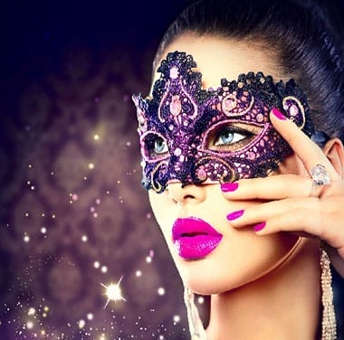 "Glamorous fashion accessories featuring jeweled leather masquerade mask"