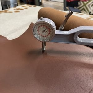 The Europa Bitter Chocolate cow leather has exceptional durability and longevity. The full-grain cowhide leather, sourced exclusively from the side of the cow, is impressively thick at 3/4 oz. (1.2-1.4mm) and has undergone chrome tannage, resulting in a soft to medium temper. These hides typically measure 16-18 sq. ft. and are sourced from Mexico. This Leather is suitable for a variety of products, including handbags, belts, shoes, straps, and accessories.