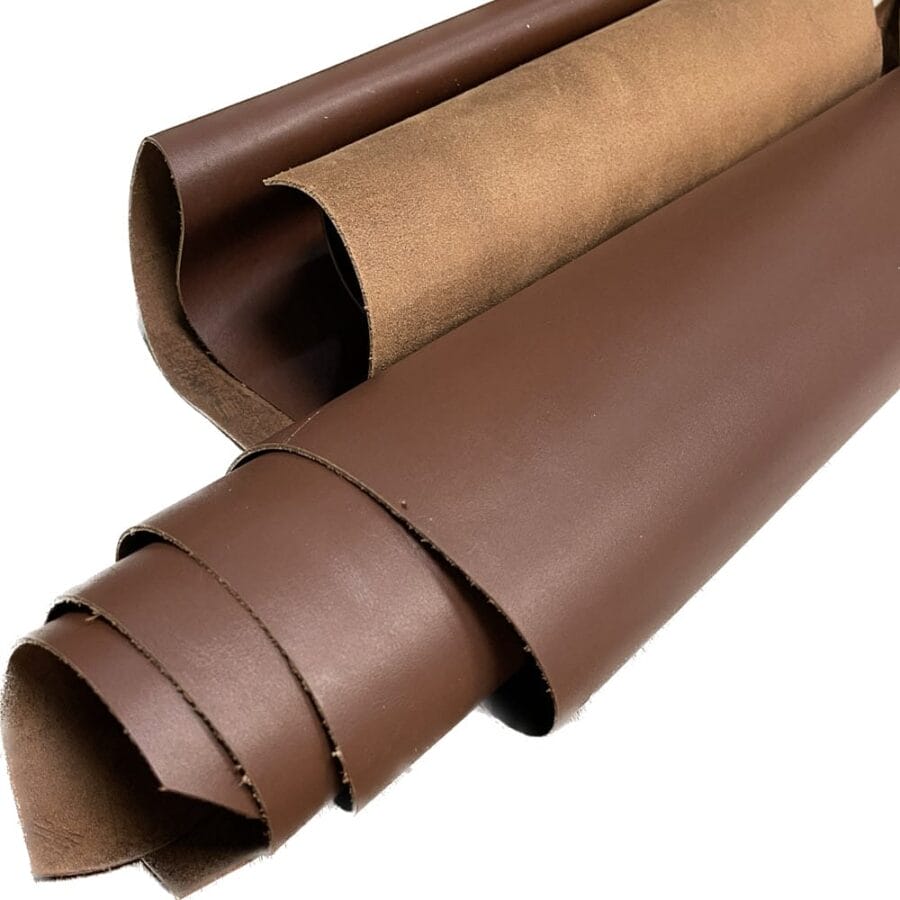 The Europa Bitter Chocolate cow leather has exceptional durability and longevity. The full-grain cowhide leather, sourced exclusively from the side of the cow, is impressively thick at 3/4 oz. (1.2-1.4mm) and has undergone chrome tannage, resulting in a soft to medium temper. These hides typically measure 16-18 sq. ft. and are sourced from Mexico. This Leather is suitable for a variety of products, including handbags, belts, shoes, straps, and accessories.