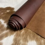 The Europa Brown Stone cow leather has exceptional durability and longevity. The full-grain cowhide leather, sourced exclusively from the side of the cow, is impressively thick at 3/4 oz. (1.2-1.4mm) and has undergone chrome tannage, resulting in a soft to medium temper. These hides typically measure 16-18 sq. ft. and are sourced from Mexico. This Leather is suitable for a variety of products, including handbags, belts, shoes, straps, and accessories.