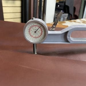 The Europa Brown Stone cow leather has exceptional durability and longevity. The full-grain cowhide leather, sourced exclusively from the side of the cow, is impressively thick at 3/4 oz. (1.2-1.4mm) and has undergone chrome tannage, resulting in a soft to medium temper. These hides typically measure 16-18 sq. ft. and are sourced from Mexico. This Leather is suitable for a variety of products, including handbags, belts, shoes, straps, and accessories.