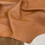 The Lambskin Leather Collection is a testament to the beauty of nature and the art of leather crafting. Made from high-quality full-grain leather with a semi-veg finish, this collection exudes an authentic and naturally worn appearance that is both timeless and luxurious. The smooth and silky texture of the leather provides a comfortable and stylish option for creating handbags, shoes, garments, and accessories.