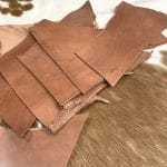 You will receive 5 pound of vegetable-tanned full-grain scrap tooling leather. This natural veg-tanned leather is perfect for smaller projects and is 100% vegetable-tanned. It is suitable for use in jewelry making, altered art, wallets, portraits, handbags, clutches, holsters, knife sheaths, and key fobs.