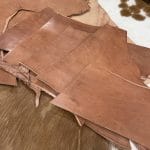 You will receive 5 pound of vegetable-tanned full-grain scrap tooling leather. This natural veg-tanned leather is perfect for smaller projects and is 100% vegetable-tanned. It is suitable for use in jewelry making, altered art, wallets, portraits, handbags, clutches, holsters, knife sheaths, and key fobs.