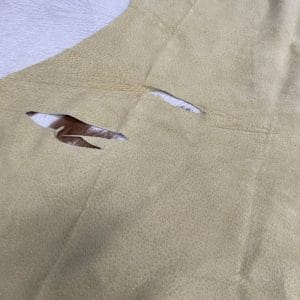 Economy Pig Suede Leather offers a unique, distinct look with characteristics that do not affect its performance. It may have uneven shade tones, dark spots, scarring, and a few holes, giving it an individualized appearance. This soft leather is made from swine raw material, weighing 2 oz. (0.6-0.8 mm) and is available in whole-hide specification. Despite minor blemishes and/or holes, it provides a soft and luxurious texture. With an average hide size of 3-9 sq. ft., it is suitable for lining in accessories, arts and crafts, bookbinding, shoes, and small leather goods.