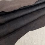 Our Montana Lambskin features a unique distressed look with a blend of earthy tones, including red, brown, black, and cognac. Its soft texture and rugged finish make it perfect for fashion pieces that need a worn-in, vintage appeal. Ideal for high-end accessories, garments, and décor, this leather offers both style and durability.