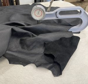 Florence lambskin leather with an aniline finish, showcasing natural blemishes and rich character through transparent dyes for a raw, authentic look.