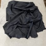 Florence lambskin leather with an aniline finish, showcasing natural blemishes and rich character through transparent dyes for a raw, authentic look.