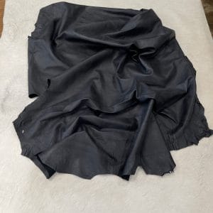 Florence lambskin leather with an aniline finish, showcasing natural blemishes and rich character through transparent dyes for a raw, authentic look.