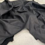 Florence lambskin leather with an aniline finish, showcasing natural blemishes and rich character through transparent dyes for a raw, authentic look.