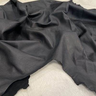 Florence lambskin leather with an aniline finish, showcasing natural blemishes and rich character through transparent dyes for a raw, authentic look.
