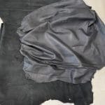 SL-103BLK 5 | Avetco Leather Hides and Eva Foam Florence lambskin leather with an aniline finish, showcasing natural blemishes and rich character through transparent dyes for a raw, authentic look.