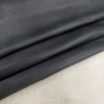 SL-103BLK | Avetco Leather Hides and Eva Foam Florence lambskin leather with an aniline finish, showcasing natural blemishes and rich character through transparent dyes for a raw, authentic look.