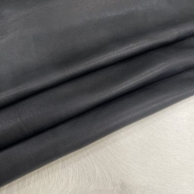 Florence lambskin leather with an aniline finish, showcasing natural blemishes and rich character through transparent dyes for a raw, authentic look.