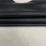 Heritage Goatskin Leather features a silky smooth texture and a refined finish. Available in rich shades of red, black, green, and purple, it offers durability and versatility for bold, sophisticated designs.