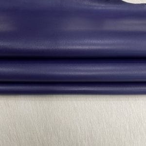 Heritage Goatskin Leather features a silky smooth texture and a refined finish. Available in rich shades of red, black, green, and purple, it offers durability and versatility for bold, sophisticated designs.