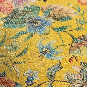 Sunset Gold Snake embossed cow leather with a bold floral texture and glossy surface, ideal for luxury leather goods – Avetco Inc.