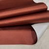 Bonded polyester satin with tricot backing, 58" wide, 0.3 mm thick. Available in Black, Champagne, Rose, Beige Copper, Bronze Red & Silver.