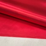 Bonded polyester satin with tricot backing, 58" wide, 0.3 mm thick. Available in Black, Champagne, Rose, Beige Copper, Bronze Red & Silver.