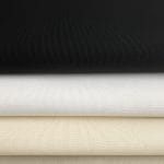 Midweight 100% cotton muslin, ideal for film production, costumes, set design, and dyeing. Available in Raw, White, and Black. Sold by 5 yards.
