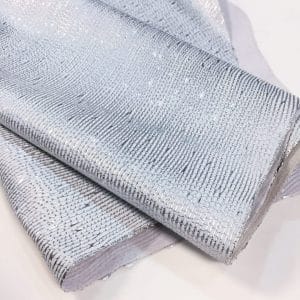 Close-up of Metallic Nubuck Cow Leather in White with Silver Foil