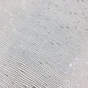 Close-up of Metallic Nubuck Cow Leather in White with Silver Foil