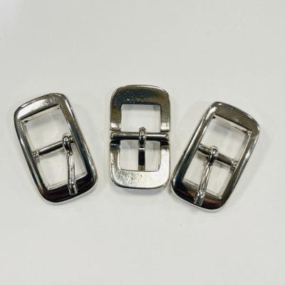 Close-up of Y1018 Center Bar Buckles in Nickel finish, made of zinc alloy, designed for straps. Compact, rectangular design with a center bar, photographed on a neutral background.
