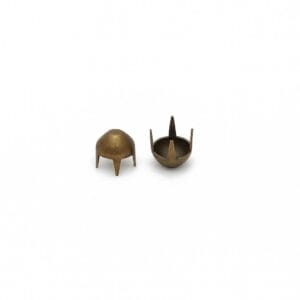6.5mm A59 cone nailheads in Antique Brass plating, shown from top and bottom views, with four prongs for secure attachment to leather or fabric.
