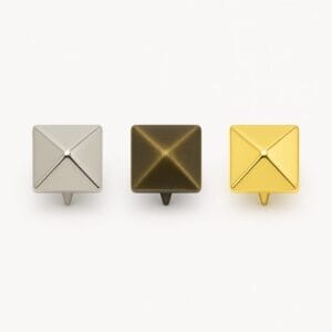 Nickel, Antique Brass, and Gold 10mm pyramid nail head a60 displayed side by side for color comparison in leathercraft and accessory use