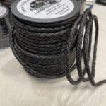 Premium braided vegetable-tanned leather cords in vintage tones. Available in 3mm & 6mm spools. Perfect for jewelry, bags, and artisan crafts.