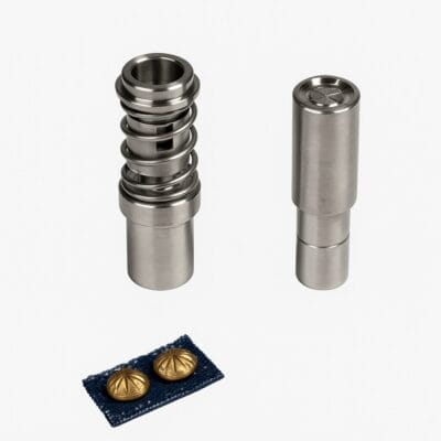 Die setter tool set for 9mm NH72 parachute nailhead, shown with a brass nailhead installed on blue fabric, designed for precise and damage-free application.