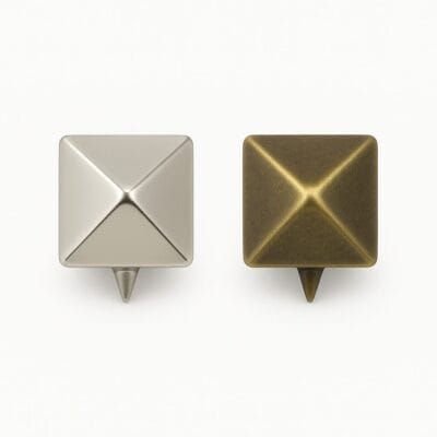 "Nickel and Antique Brass 5.5mm Pyramid Nail Head nh36 shown side by side for color and finish comparison, ideal for leathercraft and accessories